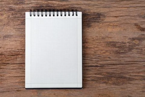 Blank empty notepad on wood background Fotos Stock
