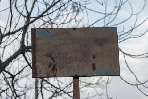 Blank, empty old rusty metal signboard with copy space for text on outdoor Stock Photos