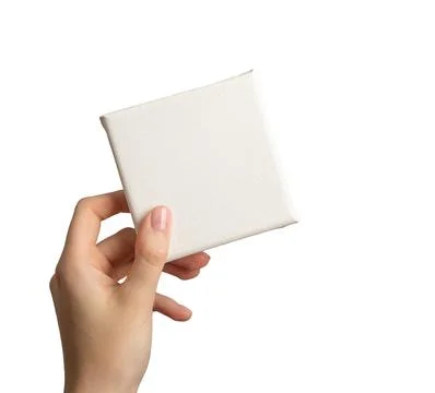 Blank empty white canvas mockup in hand, isolated on white Stock Photos