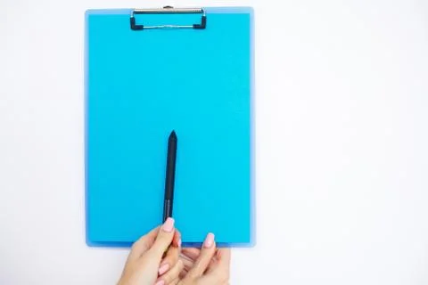 Blank Folder with Blue Paper. Hand that Holding Folder and Pen on White Stock Photos