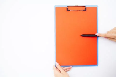 Blank Folder with Red Paper. Hand that Holding Folder and Pen on White Stock Photos