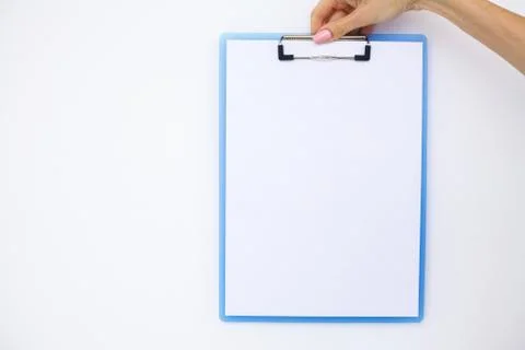 Blank Folder with White Paper. Hand that Holding Folder and Handle on White Foto stock