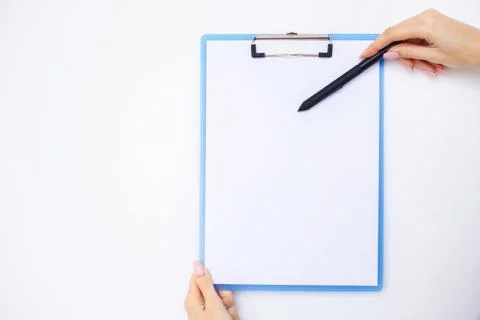 Blank Folder with White Paper. Hand that Holding Folder and Handle on White Stock Photos
