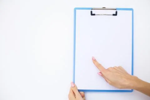 Blank Folder with White Paper. Hand that Holding Folder and Handle on White Stock Photos