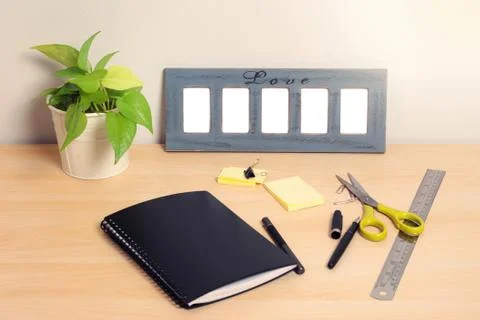 Blank frame on desktop Stock Photos