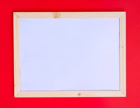 Blank frame on red background for interior design and Christmas concepts. Stock Photos