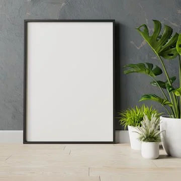 Blank frame on the wall with plant Stock Photos