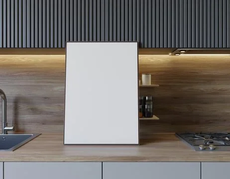 Blank framed print on kitchen counter.  Modern gray and light wood tones Illustrazione stock