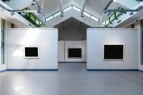 Blank frames on exhibition wall in a room blank frames fro painting or pho... Stock Photos