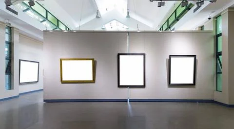 Blank frames on exhibition wall in a room blank frames fro painting or pho... Stock Photos