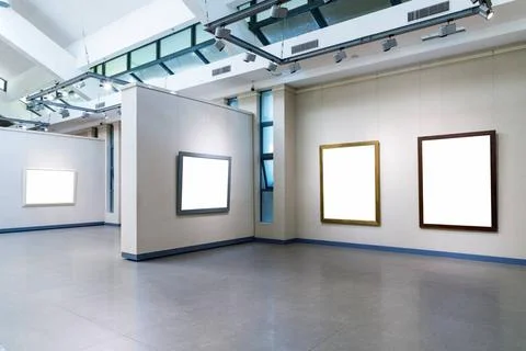 Blank frames on exhibition wall in a room blank frames fro painting or pho... Stock Photos