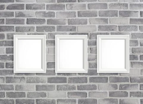 Blank frames on grey birck wall Illustrazione stock
