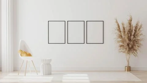 Blank frames on white wall in empty room with column and white chair with yel Stock Illustration