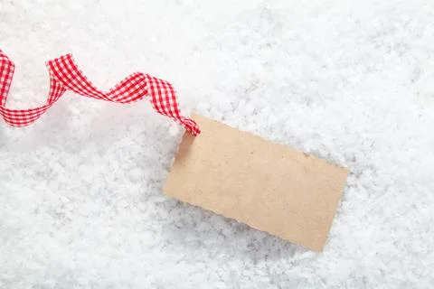 Blank gift tag in snow Stock Photos