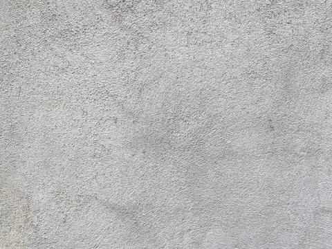 Blank gray background showcasing a rough concrete surface Foto stock