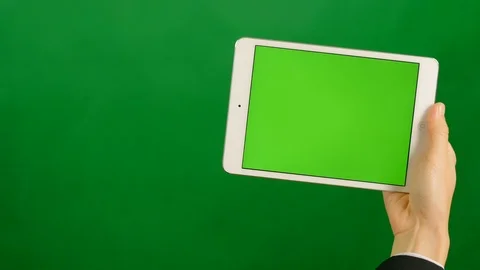A blank green screen tablet on green background. Stock Footage 88940192