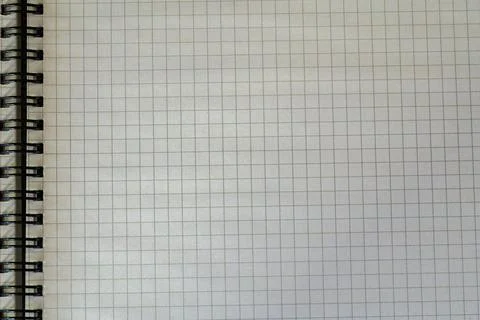 Blank grid notebook page with spiral binding top view Stock Photos