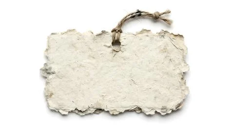 Blank handmade paper tag with rough edges and twine string isolated on whit.. Stock Photos