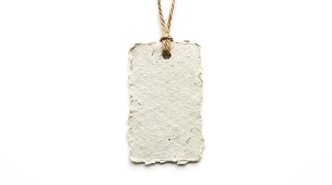 Blank handmade paper tag with rustic twine string isolated on white backgroun Stock Photos