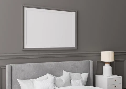 Blank horizontal picture frame on gray wall in bedroom. Mock up poster frame  Stock Photos