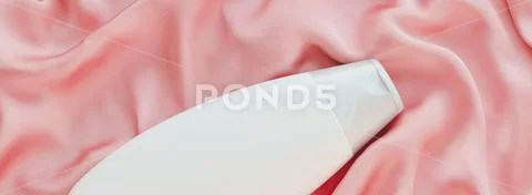 Blank label cosmetic container bottle as product mockup on pink silk background Stock Photos