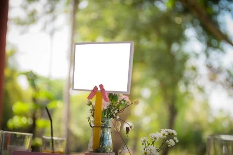 The  blank label on table with bokeh background Stock Photos