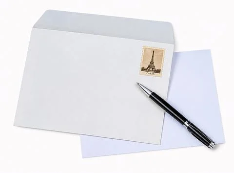 Blank Mail Envelope with Eiffel Tower Postage Stamp and Pen Stock Photos