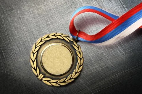 Blank medal on steel scratchy background Stock Photos