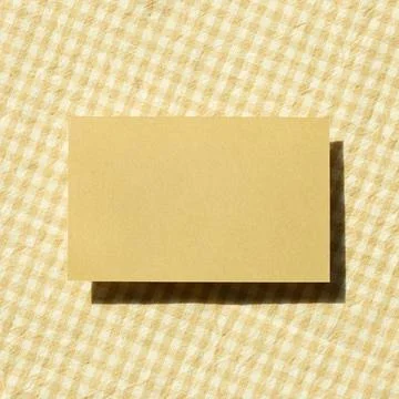 Blank memo pad, empty paper on fabric background. top view, copy space Bla... Stock-Fotos