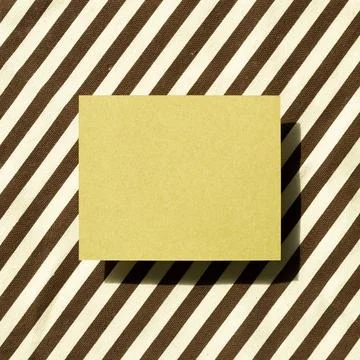 Blank memo pad, empty paper on fabric background. top view, copy space Bla... Stock-Fotos