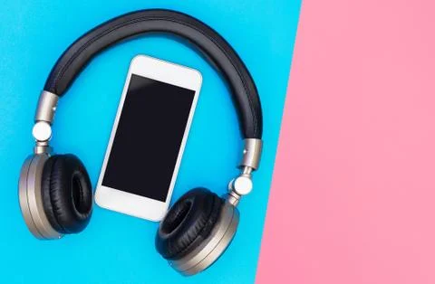 Blank Mobile phone screen inside of Golden headphone Stock Photos