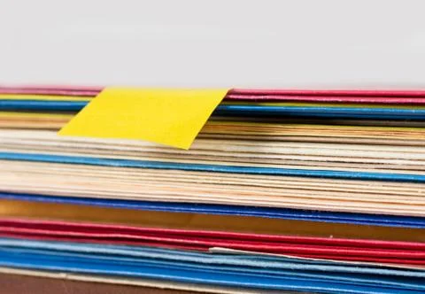 Blank note on colored folders Stock Photos