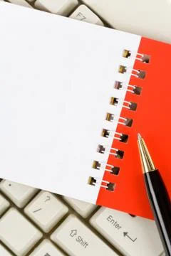 Blank Note Pad and Keyboard Stock Photos
