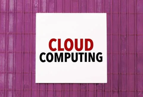 Blank note pad with text cloud computing on blue wooden background Stock Photos