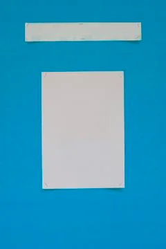 Blank note paper on blue board background Stock Photos