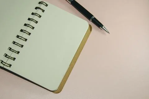 Blank notebook and pen Stock Photos