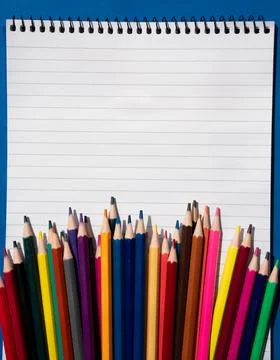 Blank notebook on blue background Stock Photos