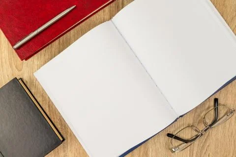 Blank notebook diary and eye glasses-3 Foto stock