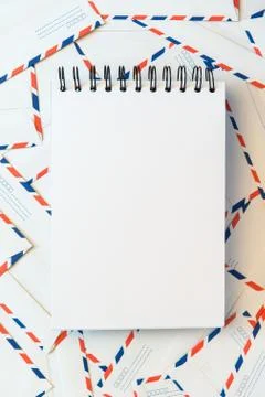 Blank notebook on envelope background Stock Photos