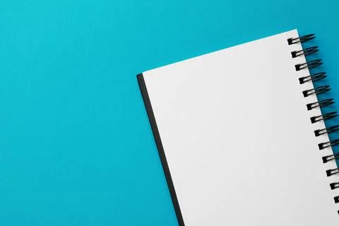 Blank notebook on light blue background, top view. Space for text Stock Photos