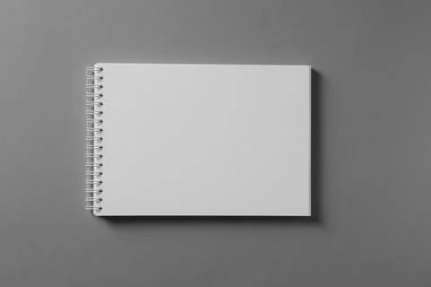 Blank notebook on light grey background, top view. Mockup for design Stock Photos