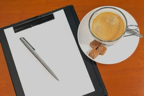 Blank notebook with pen and coffee Stock Photos