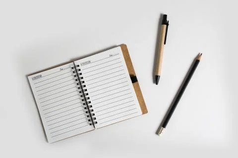 Blank notebook with pen and pencil Stock Photos