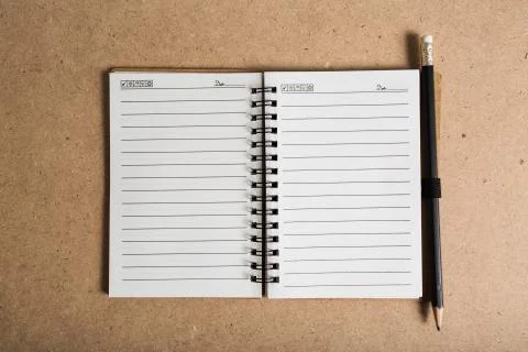 Blank notebook with pencil Stock Photos