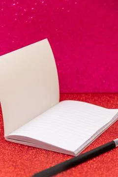 Blank notebook with ruler sheets mockup copy space on shiny red pink backgrou Stock Photos