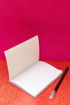 Blank notebook with ruler sheets mockup copy space on shiny red pink backgrou Stock Photos