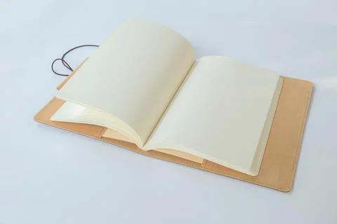 Blank Notebook on a White Paper Background Stock Photos