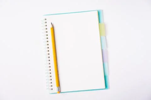 Blank notebook on white table Stock Photos