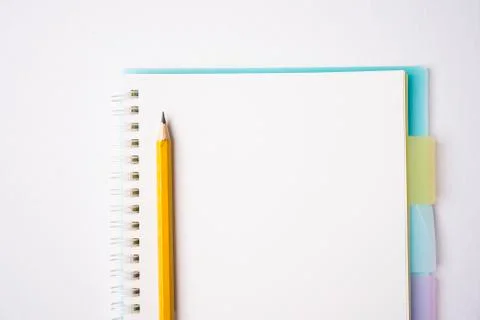 Blank notebook on white table Stock Photos
