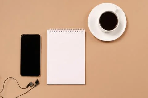 Blank notepad for action plans goals coffee cup phone pastel background Stock Photos